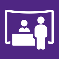 icon with person seated behind desk with another waiting in front to be helped