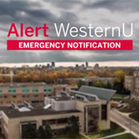 Alert WesternU Emergency Notification, text in front of dark sky over Western